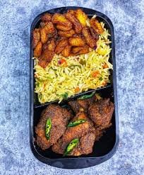 Ghana Coconut Rice, plantain, and Goatmeat 